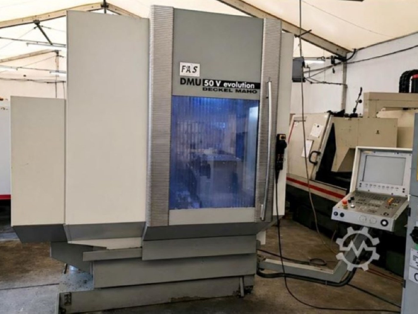 Machine CNC atelier SOMEGE — sous-traitance usinage Île-de-France